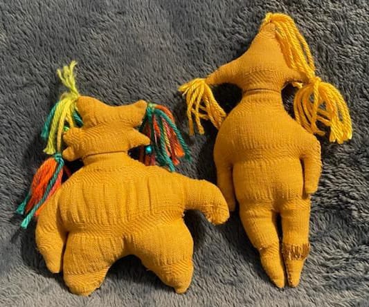 Two weezers made of yellow canvas