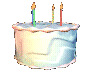 A rotating 3d model of a white birthday cake.