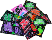 A transparent png of several packages of Pop Rocks.