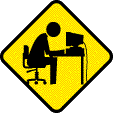 A black and yellow diamond sign of a stick figure banging their head against a computer desk.